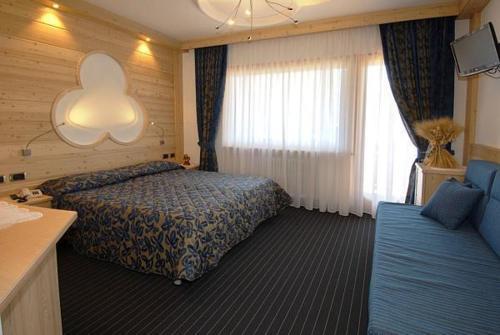 Hotel Flora Alpina Campitello di Fassa Bagian luar foto