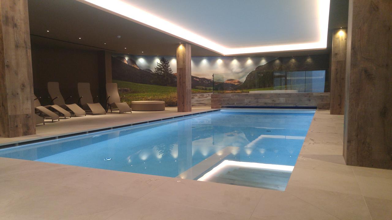 Hotel Flora Alpina Campitello di Fassa Bagian luar foto